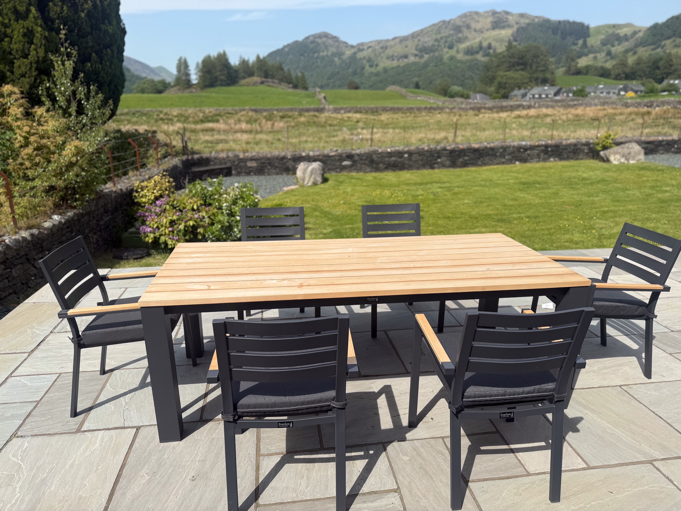 Outdoor dining table on the garden terrace with fell views